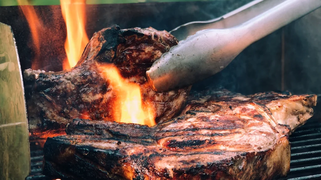BBQ grill and cooking tongs for Singapore BBQ pit rental planning